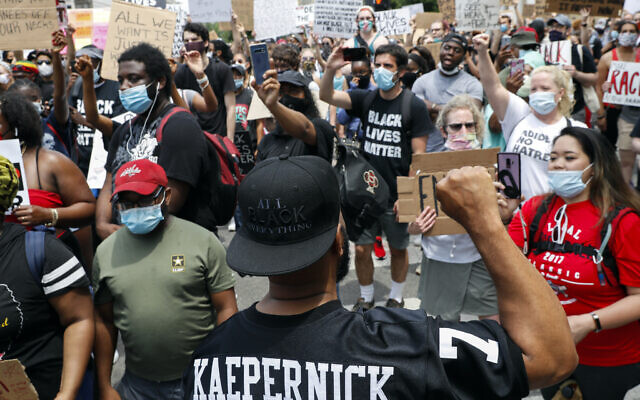 Demonstrators protest on June 6, 2020, near the White House in Washington, over the death of George Floyd, a black man who was in police custody in Minneapolis. Floyd died after being restrained by Minneapolis police officers. (AP/Jacquelyn Martin)