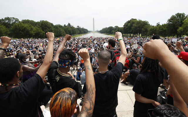 Demonstrators protest on June 6, 2020, at the Lincoln Memorial in Washington, over the death of George Floyd, a black man who was in police custody in Minneapolis. Floyd died after being restrained by Minneapolis police officers. (AP/Alex Brandon)