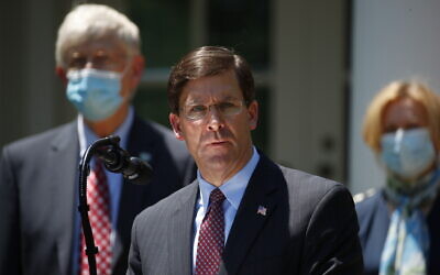 Defense Secretary Mark Esper speaks during a press briefing about the coronavirus in the Rose Garden of the White House on May 15, 2020, in Washington. (AP Photo/Alex Brandon)