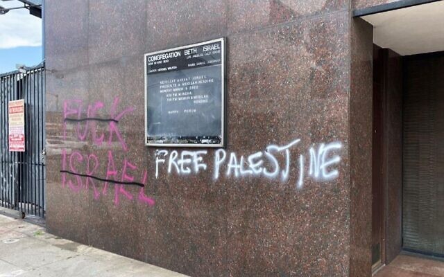 Graffiti was spray-painted on the walls of Congregation Beth Israel in the Fairfax district of Los Angeles, May 30, 2020. (Lisa Daftari/Twitter via JTA)