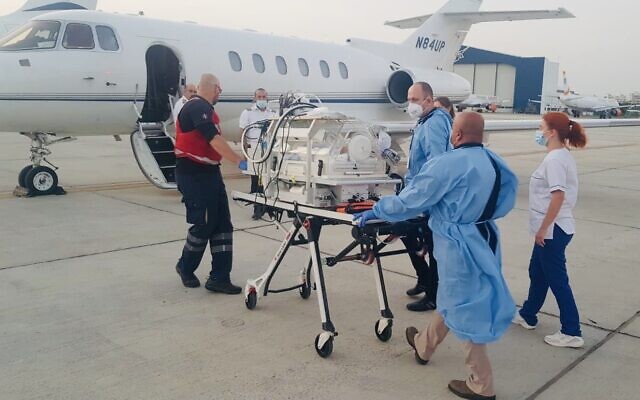 A 10-day-old Syrian baby is flown from Cyprus to Israel for emergency surgery on June 11, 2020. (Sammy Revel/Twitter)