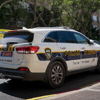 FILE -- A police car parked in Petah Tikva, August 4, 2017 (Roy Alima/Flash90)