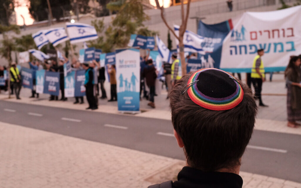 Illustrative: Religious Jewish activists protest same-sex parenting and LGBTQ families, across from LGBTQ advocates in Tel Aviv, December 16, 2018. (Tomer Neuberg/Flash90)