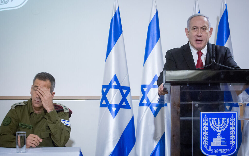 Prime Minister Benjamin Netanyahu and IDF Chief of Staff Aviv Kohavi at a press conference after a security cabinet meeting following an outbreak of violence with terror groups in the Gaza Strip, at the Kirya headquarters in Tel Aviv, on November 12, 2019. (Miriam Alster/Flash90)
