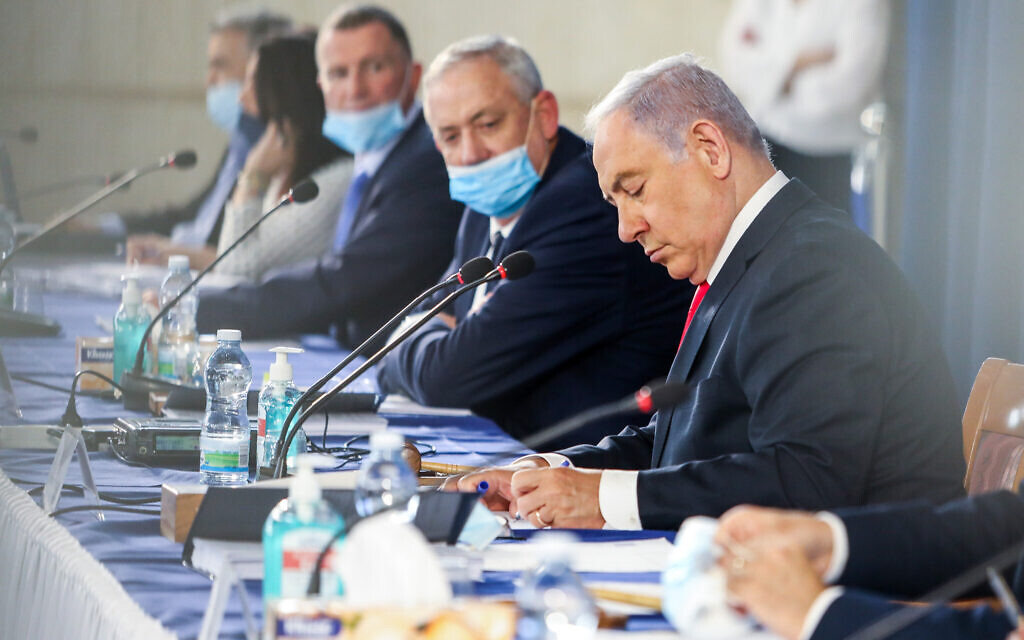 Prime Minister Benjamin Netanyahu, right, and Defense Minister Benny Gantz lead a weekly cabinet meeting, at the Foreign Ministry in Jerusalem on June 7, 2020. (Marc Israel Sellem)