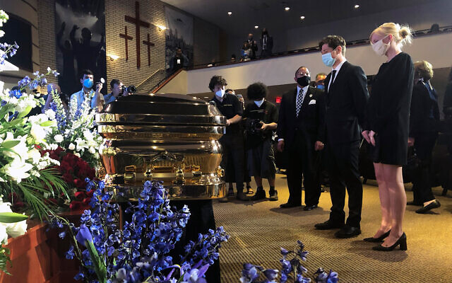 Minneapolis Mayor Jacob Frey, second from right, and First Lady Sarah Clarke, right, pause before George Floyd's casket, June 4, 2020, before a memorial service for Floyd in Minneapolis. (AP/Bebeto Matthews)