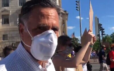 Senator Mitt Romney takes part in a Black Lives Matter march in Washington DC on June 7, 2020 (Screencapture/Twitter)