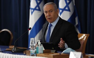 Prime Minister Benjamin Netanyahu chairs the weekly cabinet meeting in Jerusalem on June 28, 2020. (Ronen Zvulun/Pool/AFP)