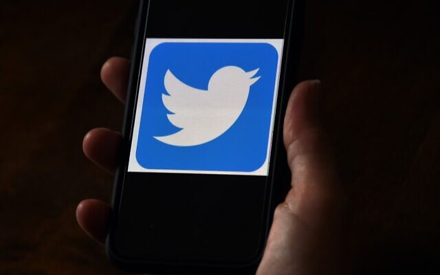 In this file photo illustration, a Twitter logo is displayed on a mobile phone on May 27, 2020, in Arlington, Virginia. (Olivier DOULIERY / AFP)