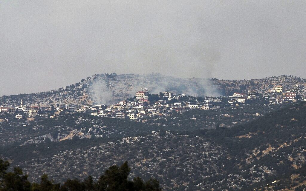 A picture taken from the Israeli side of the Blue Line that separates Israel and Lebanon shows smoke billowing above Mount Dov on the Israeli-Lebanese border, after reports of clashes between the IDF and Hezbollah in the area, on July 27, 2020. (Jalaa MAREY / AFP)