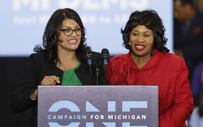 In an October 26, 2018, file photo, Rashida Tlaib, left, then-Democratic candidate for the Michigan's 13th Congressional District, and Brenda Jones speak during a rally in Detroit. (AP/Paul Sancya, File)