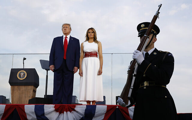 US President Donald Trump and first lady Melania Trump stand onstage during a "Salute to America" event on the South Lawn of the White House, Saturday, July 4, 2020, in Washington. (AP/Patrick Semansky)