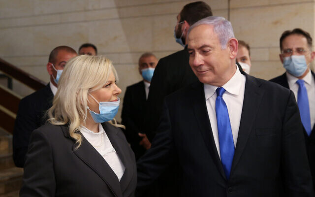 Prime Minister Benjamin Netanyahu and his wife Sara at the swearing in ceremony of the 23rd government in the Knesset on May 17, 2020. (Alex Kolomoisky/Flash90)