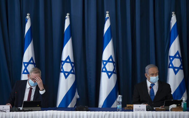 Prime Minister Benjamin Netanyahu (R) and Defense Minister Benny Gantz at the weekly cabinet meeting, at the Foreign Affairs Ministry in Jerusalem, on July 5, 2020. (Amit Shabi/POOL)