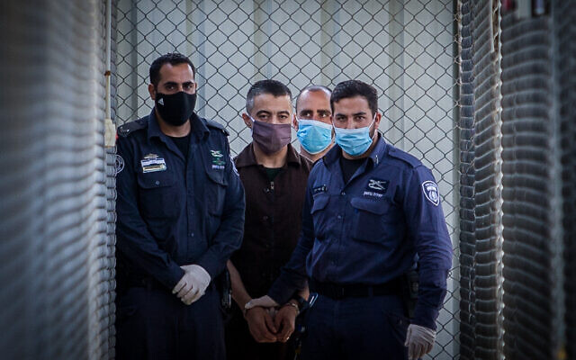 Shaban Titi is brought to the courtroom for his sentence at the Ofer military court near the West Bank city of Ramallah on July 6, 2020. (Flash90)