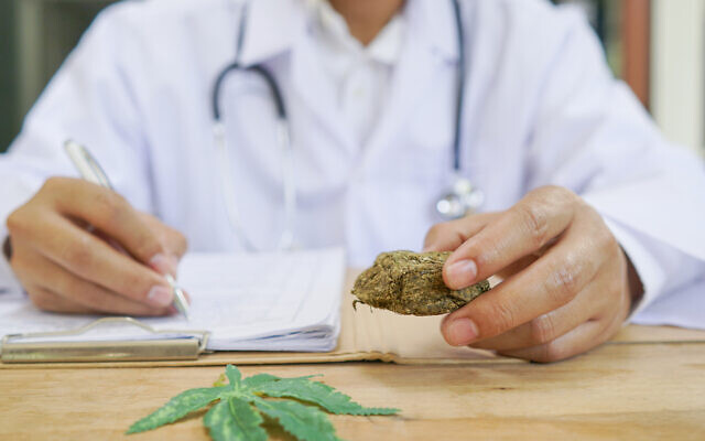 Illustrative. A doctor writes a prescription for medical marijuana. (iStock)