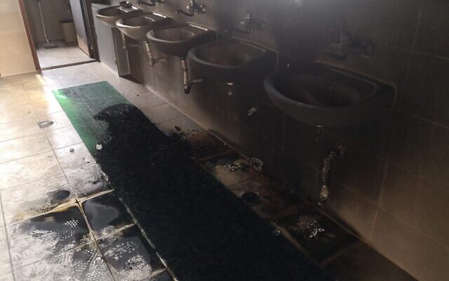Charred sinks in an el-Bireh mosque that was torched overnight July 27, 2020, in an apparent hate attack by extremist Jews (Iyad Hadad/B'Tselem)