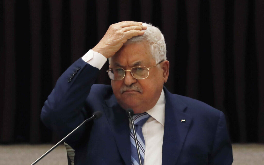 Palestinian Authority President Mahmoud Abbas gestures during a meeting to discuss the United Arab Emirates' deal with Israel to normalize relations, in the West Bank city of Ramallah, August 18, 2020. (Mohamad Torokman/Pool Photo via AP, File)