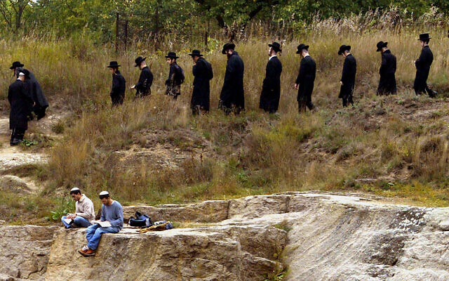 Illustrative: A group of Orthodox Jews pray around the holy Jewish sites of Uman, Ukraine, September 21, 2006. (AP/Efrem Lukatsky)