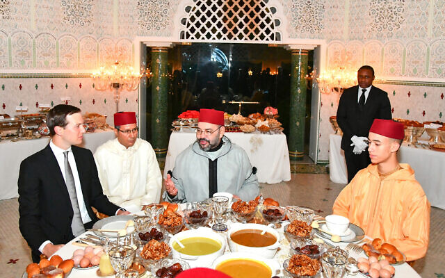 Moroccan King Mohammed VI (center) chats with Jared Kushner, senior adviser to US President Donald Trump (left) as crown Prince Moulay Hassan (right) looks on before an Iftar meal, the evening meal when Muslims end their daily Ramadan fast at sunset, at the King Royal residence in Sale, Morocco, May 28, 2019. (Moroccan Royal Palace, via AP)