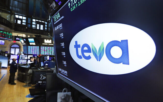 The logo for Teva appears above a trading post on the floor of the New York Stock Exchange, October 21, 2019.  (AP Photo/ Richard Drew)