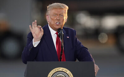 US President Donald Trump speaks during a campaign rally at Manchester-Boston Regional Airport, August 28, 2020, in Londonderry, New Hampshire. (AP Photo/Charles Krupa)