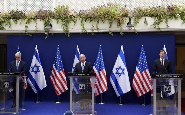 US National Security Adviser Robert O’Brien, left, Prime Minister Benjamin Netanyahu, center, and White House adviser Jared Kushner make joint statements to the press about the Israeli-United Arab Emirates peace accords, in Jerusalem, August 30, 2020. (Debbie Hill/Pool Photo via AP)