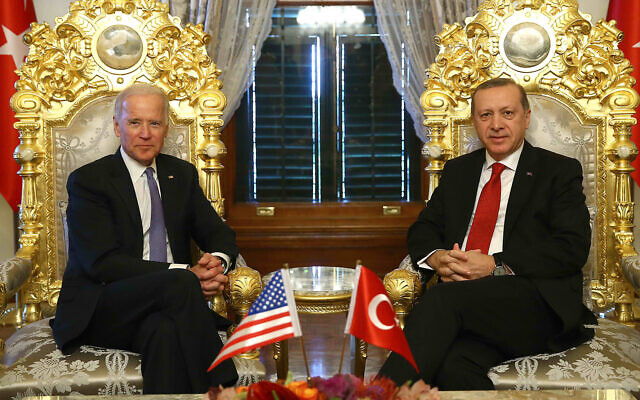 Then-US vice president Joe Biden, left, poses for photographers with Turkish President Recep Tayyip Erdogan, right, prior to a meeting at Yildiz Mabeyn Palace in Istanbul on January 23, 2016. (Kayhan Ozer/ Presidential Press Service, Pool via AP)