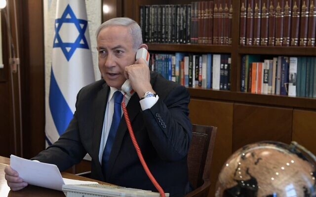 Illustrative: Prime Minister Benjamin Netanyahu at his office in Jerusalem on a phone call with UAE leader Mohammed Bin Zayed on August 13, 2020. (Kobi Gideon/PMO)