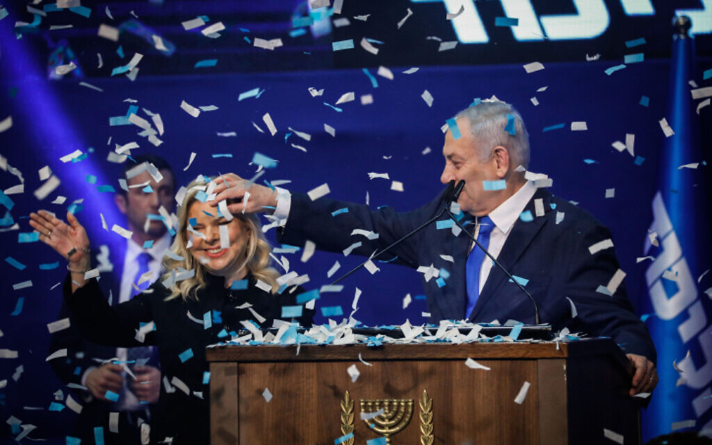 Prime Minister Benjamin Netanyahu and his wife Sara celebrating election night in Tel Aviv on March 3, 2020. (Olivier Fitoussi/Flash90)