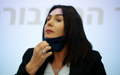 Transportation Minister Miri Regev, who lowered her face mask to speak, during a press conference at the Transportation Ministry in Jerusalem on July 8, 2020. (Olivier Fitoussi/Flash90)