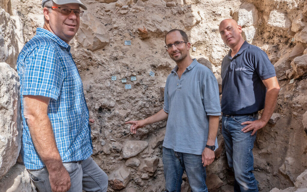 From left-right: Prof. Yuval Gadot, TAU PhD student Yoav Vaknin, IAA archaeologist Dr. Yiftach Shalev at the site where remnants of the 586 BCE destruction of Jerusalem by the Babylonians were discovered in the City of David Park in Jerusalem. (Shai Halevi/Israel Antiquities Authority)