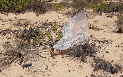 A suspected balloon-borne explosive device lands outside a community in the Hof Ashkelon region of southern Israel on August 24, 2020. (Israel Police)