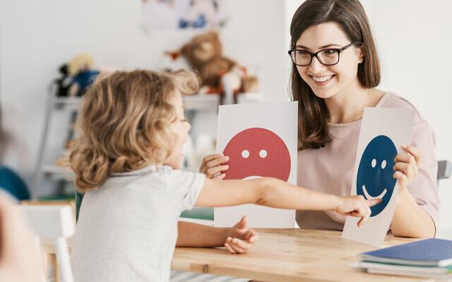 Emotion emoticons used by a psychologist during a therapy session with a child with autism. (iStock)