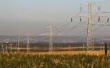 Power lines next to Moshav Bnei Re'em in central Israel, April 26, 2010. (Nati Shohat/ Flash90/ File)