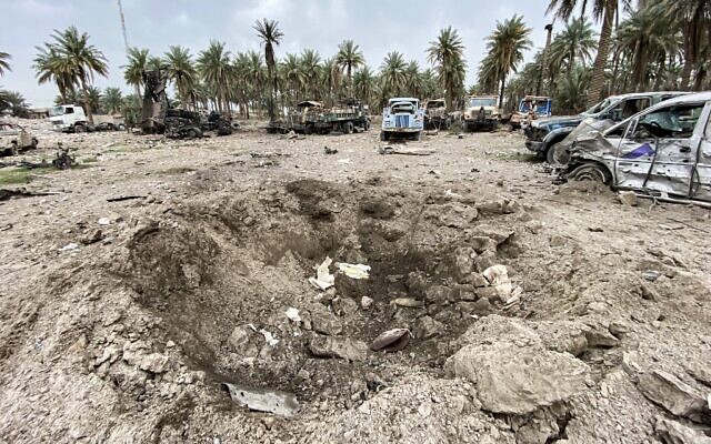 An impact crater in the aftermath of US military air strikes at a militarized zone in the Jurf al-Sakhr area in Iraq's Babylon province (south of the capital) controlled by Hezbollah Biridages, a hardline faction of the Popular Mobilization Forces paramilitaries, March 13, 2020. (Photo by AFP)