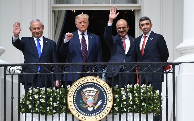 Israeli Prime Minister Benjamin Netanyahu, US President Donald Trump, Bahrain Foreign Minister Abdullatif al-Zayani, and UAE Foreign Minister Abdullah bin Zayed Al-Nahyan wave from the Truman Balcony at the White House after they participated in the signing of the Abraham Accords, where the countries of Bahrain and the United Arab Emirates recognize Israel, in Washington, DC, September 15, 2020. (SAUL LOEB / AFP)