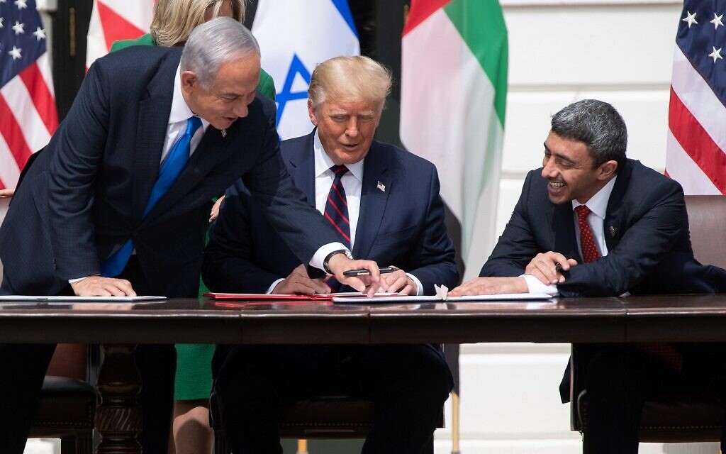 L-R: Prime Minister Benjamin Netanyahu, US President Donald Trump, and UAE Foreign Minister Abdullah bin Zayed Al-Nahyan participate in the signing of the Abraham Accords at the White House on September 15, 2020. (Saul Loeb/AFP)