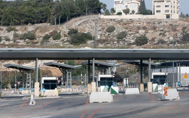 A picture taken from Beit Jala shows the Israeli checkpoint that links the West Bank city of Bethlehem to Jerusalem, after it was closed by the authorities in a bid to contain the spread of the novel coronavirus, on September 19, 2020. (Hazem Bader/AFP)