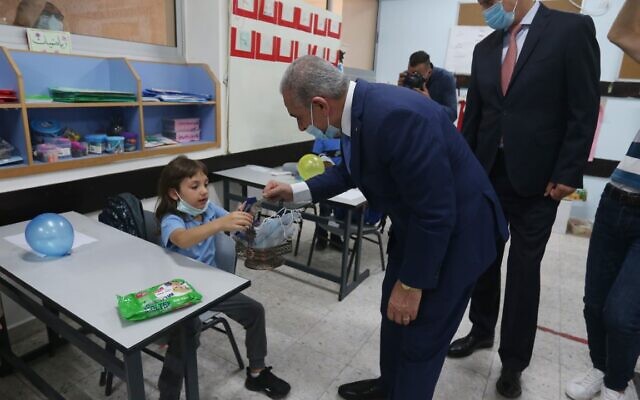 Palestinian Authority Prime Minister Mohammad Shtayyeh visits an elementary school in Ramallah, on September 6, 2020. (WAFA)