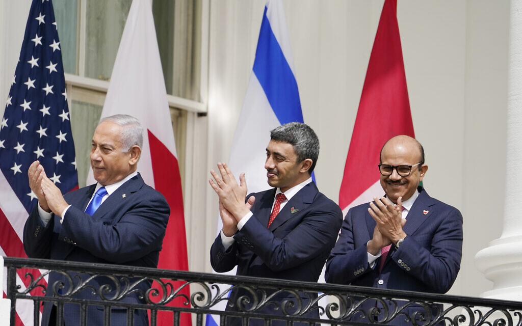 Israeli Prime Minister Benjamin Netanyahu, United Arab Emirates Foreign Minister Abdullah bin Zayed al-Nahyan and Bahrain Foreign Minister Abdullatif al-Zayani stand on the Blue Room Balcony during the Abraham Accords signing ceremony on the South Lawn of the White House, Tuesday, Sept. 15, 2020, in Washington. (AP Photo/Alex Brandon)