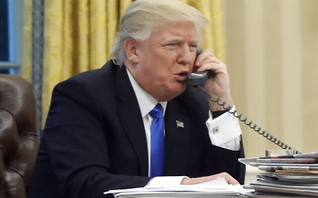 Illustrative: In this January 28, 2017, file photo, US President Donald Trump speaks on the phone with Prime Minister of Australia Malcolm Turnbull in the Oval Office of the White House in Washington. (AP/Alex Brandon, File)