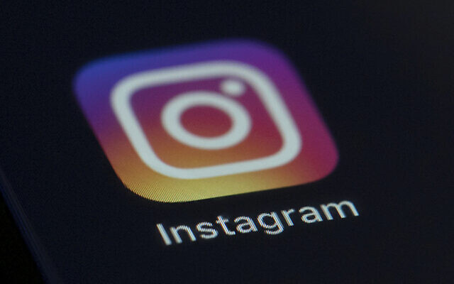 Instagram app icon on the screen of a mobile device in New York, on August, 2019. (AP Photo/Jenny Kane)