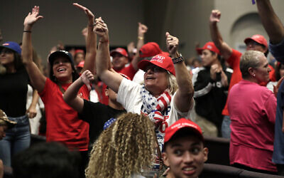 Supporters of US President Donald Trump during a rally for evangelical supporters at the King Jesus International Ministry, Jan. 3, 2020, in Miami. (AP Photo/Lynne Sladky)