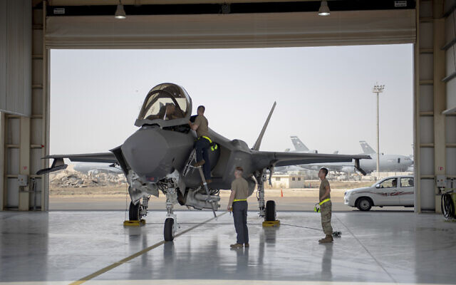 In this August 5, 2019, photo released by the US Air Force, an F-35 fighter jet pilot and crew prepare for a mission at Al-Dhafra Air Base in the United Arab Emirates. (Staff Sgt. Chris Thornbury/US Air Force via AP)