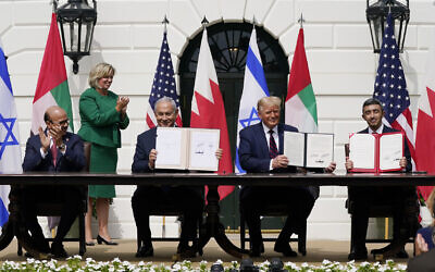 US President Donald Trump, center, with from left, Bahrain Foreign Minister Khalid bin Ahmed Al Khalifa, Prime Minister Benjamin Netanyahu, Trump, and United Arab Emirates Foreign Minister Abdullah bin Zayed al-Nahyan, during the Abraham Accords signing ceremony on the South Lawn of the White House, September 15, 2020, in Washington. (AP Photo/Alex Brandon)