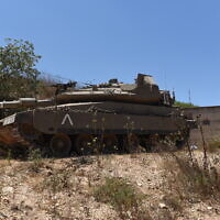 An IDF tank stands at-the-ready near the Lebanese border in an undated photograph. (Israel Defense Forces)