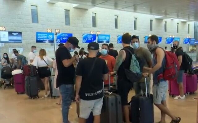 Israelis prepare to check in for their flights at Ben Gurion Airport, September 19, 2020 (Channel 12 screenshot)