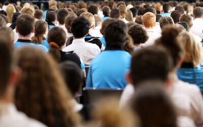 Illustrative: A large number of students sitting at a high school assembly.  (Lincoln Beddoe/ Istock Images)