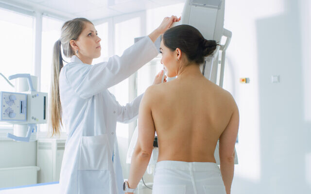 A patient receives a mammogram. (iStock)